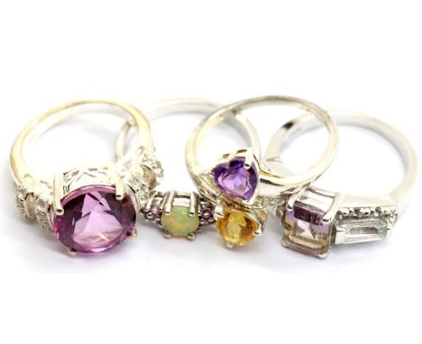 Four 925 silver assorted stone set rings combined weight 14g, P&amp;P Group 1 (£14+VAT for the first lot and £1+VAT for subse