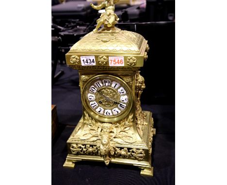 A 19th century French ormolu and lacquered brass 8 day table clock, chiming on a gong, circa 1870, H: 49 cm. Not available fo