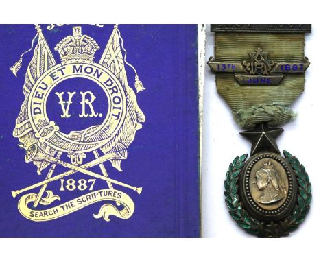 Queen Victoria Jubilee 1887 enamelled white metal medal and a Jubilee edition of The New Testament. P&amp;P Group 1 (£14+VAT 