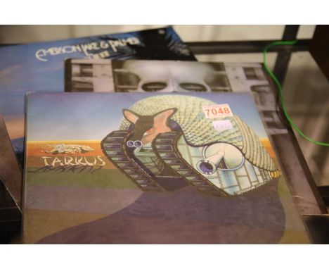 4 Emerson, Lake &amp; Palmer LP's to include, 'Brain Salad Surgery', 'Love Beach', 'Emerson, Lake &amp; Palmer' and 'Tarcus'.