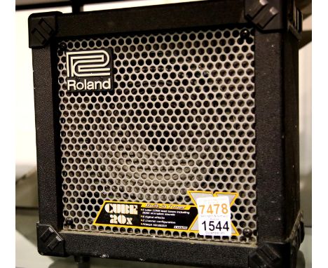 Roland Cube 20X guitar amplifier. P&P Group 3 (£25+VAT for the first lot and £5+VAT for subsequent lots)Condition Report: No 