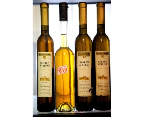 Three 50cl bottles of Beeren Auslese dessert wine 2004 and a mystery bottle. P&amp;P Group 3 (£25+VAT for the first lot and £