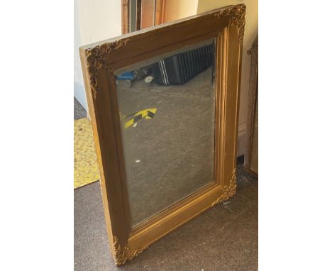 Vintage mirror in heavy gold frame, approximate measurements Height 29.5 inches, Width22 inches 