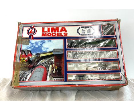 Lima model train part set, in original box contains engines, carriages etc 