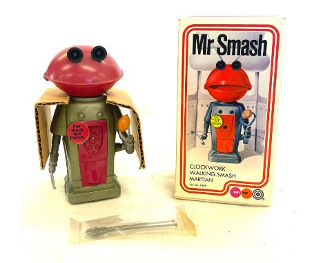 Vintage plastic wind up Mr Smash, clockwork walking smash martian, Marx toys, un- used 