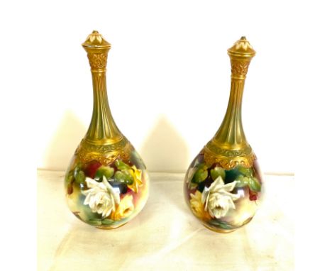 Pair of signed R Austin Royal Worcester vases measures 9.5" tall,&nbsp;chips to lids, otherwise good overall condition