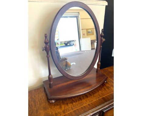 Small ornate dressing table mirror, approximate height 17 inches, Width 14 inches, Depth of base 7 inches 
