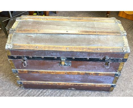 Antique travel trunk with large quantity of linen 