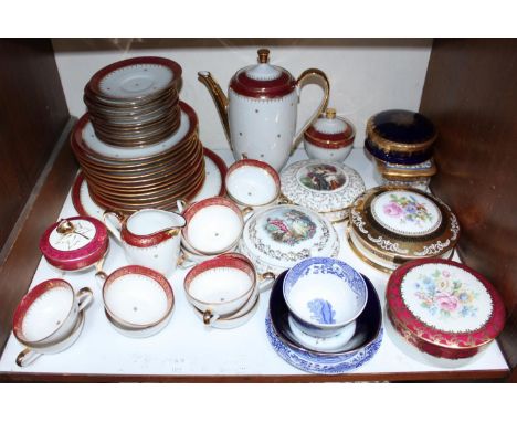 SECTION 3. A French porcelain part coffee and dinner service, with red and gilt decoration, comprising plates, a coffee pot, 