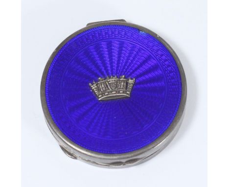 A silver and Royal blue enamel circular compact by Gieves Ltd, the lid mounted with a naval coronet, hallmarked Birmingham, 1