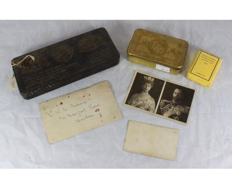A Princess Mary Christmas 1914 tin containing two packets of cigarettes, (one sealed one full but open), Christmas card and a