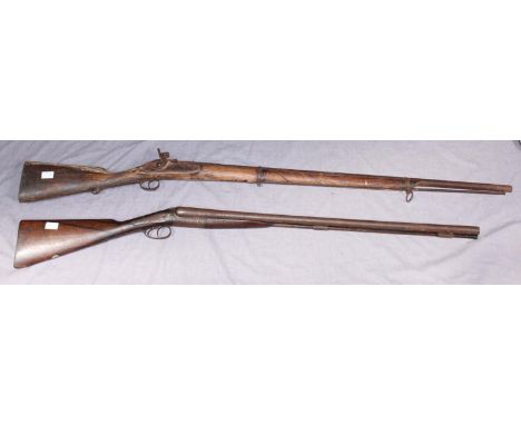 A 19th century European Percussion lock two-ring musket, with 36.5-inch barrel, frozen hammer, clearing rod, walnut stock, re