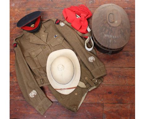 A Pith helmet in tin nat box together with a Royal Marines 'King's Squadron' khaki jacket and trousers, white leather belt, c