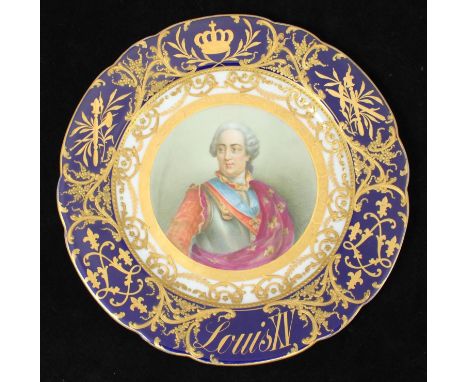 A 19th century Sevres porcelain cabinet plate, painted with a central portrait of Louis XV with 'Bleu du Roi' rim and heavily