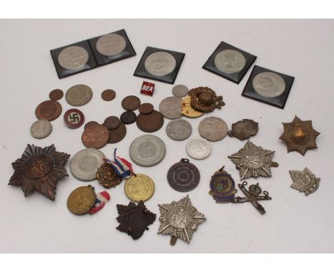 A small collection of assorted cap badges and medals etc. including a Nazi German 'National Sozialistische D.A.P.' enamel bad