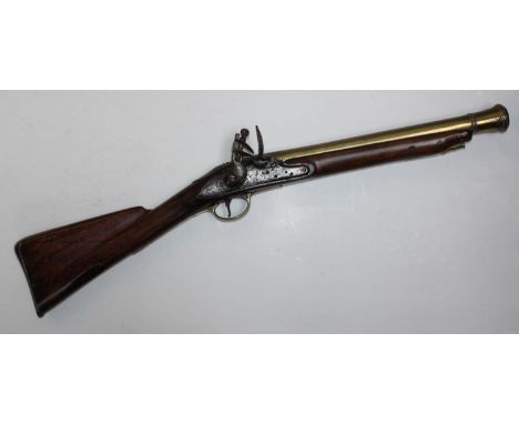 A 19th C British Naval Percussion-lock Blunderbuss, with 40cm brass flared barrel, brass butt cap, trigger guard and ramrod p