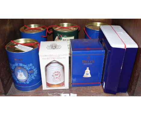 Six assorted bottles of Bell's Scotch whisky in Wade ceramic decanters and outer boxes, together with boxed commemorative Gui
