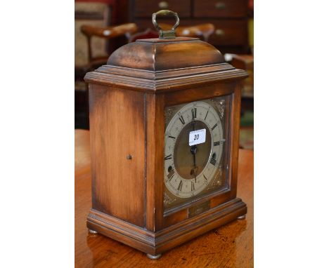 An Elliott walnut cased bracket clock, brass dial, silvered numeral ring, eight day Westminster chiming movement, complete wi