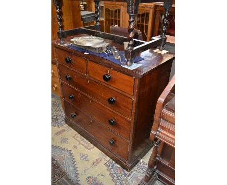 A 19th century mahogany chest of two short over three graduated long drawers, button handles, plinth base