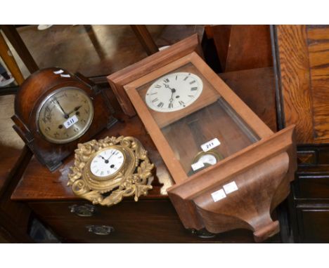 A drop dial cased wall clock; an oak cased deco mantle clock; a gilt wall clock (3)