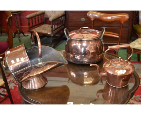 A large Victorian copper kettle, acorn finial, a copper coal scuttle, swing loop handle, a large oval copper log bin and cove