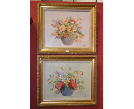 A pair of decorative floral still life oils on canvas; another oil, Seascape, framed (3)