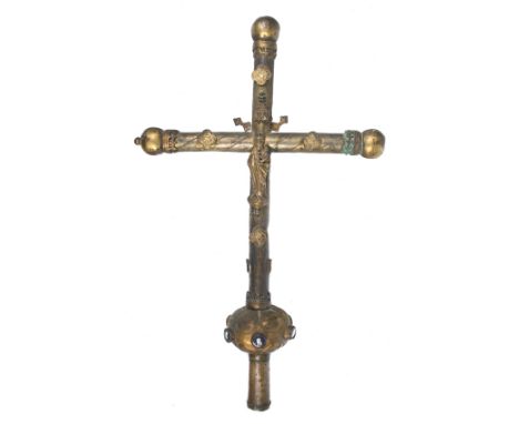 Gilded copper cross with figures and enamels affixed to it. Spain. Late Gothic. Circa 1500.61 x 39 x 10 cm.Interesting cross 