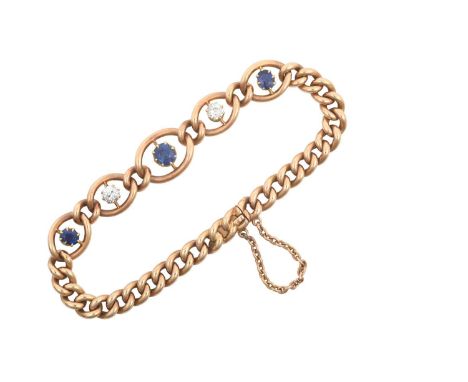 A Sapphire and Diamond Braceletthree graduated oval cut sapphires alternate with two old cut diamonds, in yellow claw setting