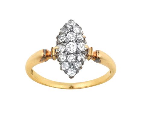 A Diamond Cluster Ringthe navette form set throughout with old cut diamonds, in white claw settings, to a yellow plain polish