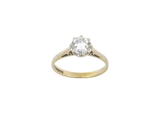 An 18 Carat White Gold Diamond Solitaire Ringthe round brilliant cut diamond in a claw setting, to a tapered shoulder plain p