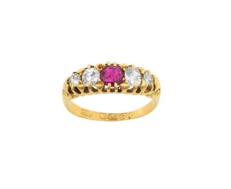 An 18 Carat Gold Ruby and Diamond Five Stone Ringthe round cut ruby flanked by graduated old cut diamonds, in yellow claw set