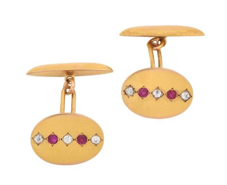 A Pair of Ruby and Diamond Cufflinks, by Hamann &amp; Kochthe yellow oval plaques inset with two round cut rubies alternating