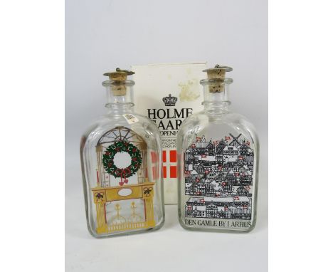 2 Vintage Holmegaard christmas decanters, one has a box. Approx 19cm tall.