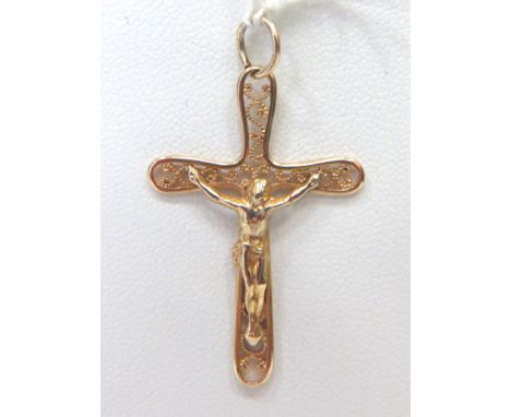 9ct Yellow Gold Crucifix Pendant which measures 38mm long weighs 1.3g