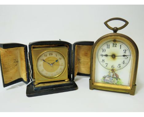 Zenith, Swiss made portable alarm clock with original case plus one brass cased small clock, both non runners for spares or r