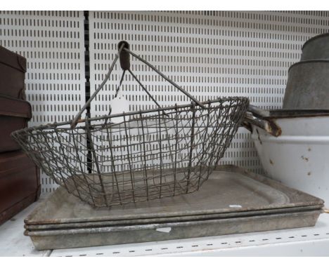 Vintage galvanised trays and a wire basket.