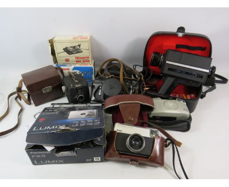 Photography lot vintage cameras and camcorder plus a boxed modern camera see photos for makers.