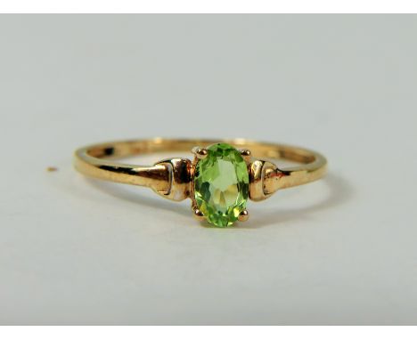 9ct Yellow Gold ring set with a small Green Tinged Citrene which measures approx 6 x 4 mm.   Finger size M-5 t N    0.8g