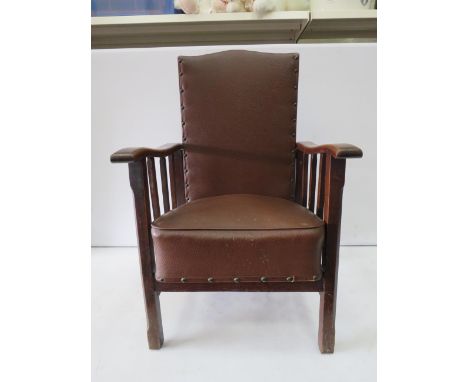 Vintage wooden and leather Atcraft reclining childs chair, approx 28" tall and 18" wide.