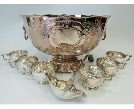 Large Sheffied A1 Silver plate on Copper Punch bowl decorated with hand chased scrolls, unmarked cartouche and Lion mask Hand