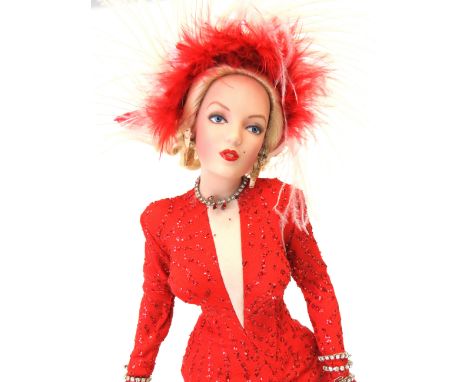 Franklin Heirloom Marilyn Monroe Doll. As new and unused in original box. Measures approx 18.5 inches. Dressed in the 'Gentle