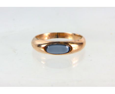 9ct Yellow Gold Ring set with a Pale Blue Carnelian sliver.   Finger size 'R'   1.8