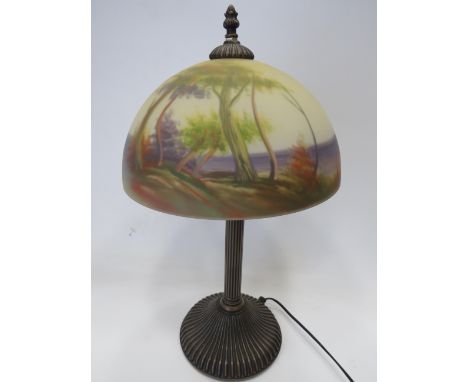 Lovely Table lamp with heavy reeded base. Galle style frosted/painted glass shade which depicts forest Trees.   Working order