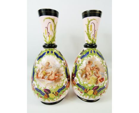 Pair of Milk Glass Vases which have transfer print and hand applied decoration showing cherubs.  Each in excellent condition 