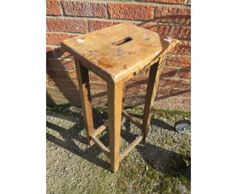 Vintage Machinists work stool approx 27 inches tall with hand hold to seat. See photos. 