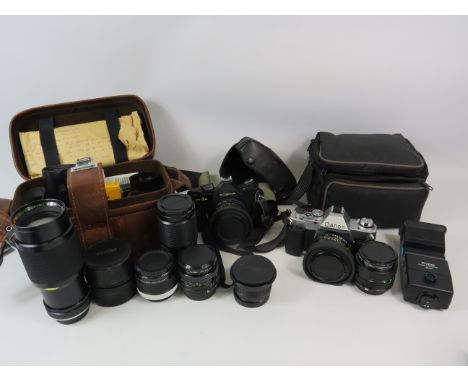 2 Vintage cameras Cannon &amp; Cosina plus various lenses by Vivtar etc.