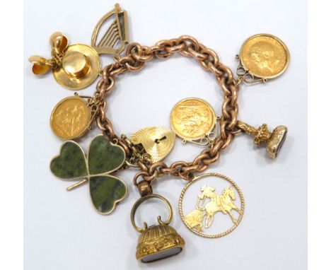 Heavy Solid Link 9ct Gold Bracelet festooned with 9ct Charms, Two Half Sovereigns and one Full Sovereign. Total weight 91.9g