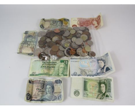 Selection of various coins and various vintage banknotes.