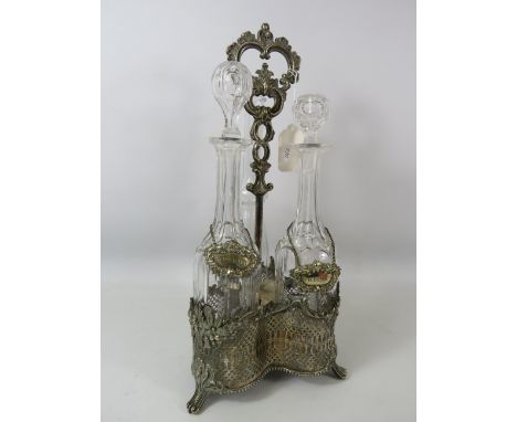 White metal 3 bottle decanter holder, please note bottles not a matching set.