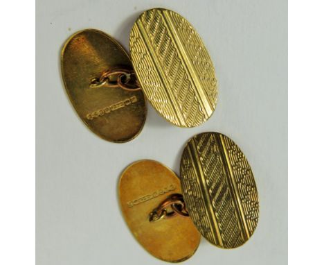 Pair of 9ct Yellow Gold Cufflinks with machined decorations, each inscribed (Jeff)  Total weight 2.8g